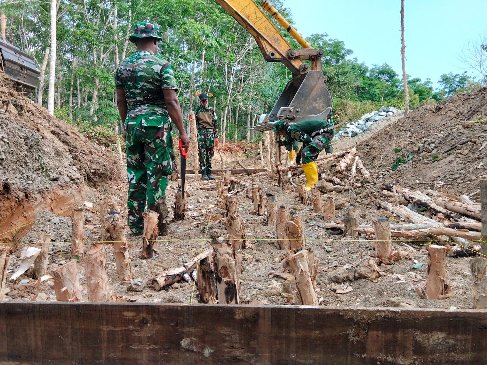 Satgas TMMD Ke-130 Perkuat Fondasi Jembatan Beton di Desa Karang Rejo